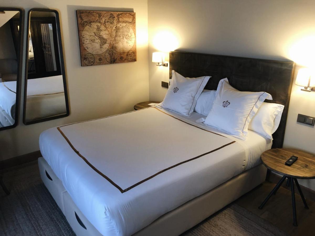 Hotel Boutique Casa Del Comendador นาวาลการ์เนโณ ภายนอก รูปภาพ